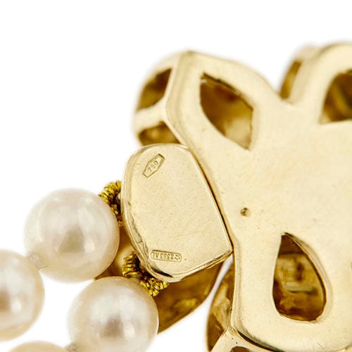 Bracelet Bracelet double rang de perles et diamants en or jaune 18 carats 58 Facettes 27351