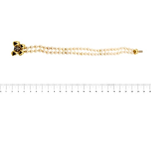 Bracelet Bracelet double rang de perles et diamants en or jaune 18 carats 58 Facettes 27351