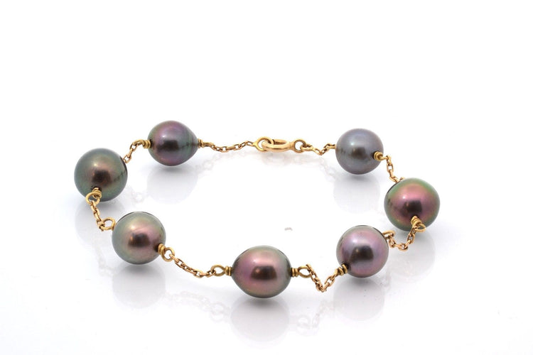 Bracelet Bracelet en or 18 carats avec perles de culture de Tahiti 58 Facettes 27723