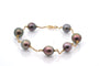 Bracelet Bracelet en or 18 carats avec perles de culture de Tahiti 58 Facettes 27723