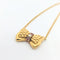 Collier Fred - Collier Nœud en or jaune, diamant et rubis 58 Facettes 28068