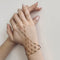 Bracelet Bracelet de main segmenté triangulaire en or rose 14 kt 58 Facettes 28163