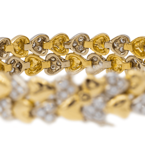 Bracelet Bracelet motifs cœur en or jaune et or blanc 18 carats et diamants 58 Facettes 3036216CN