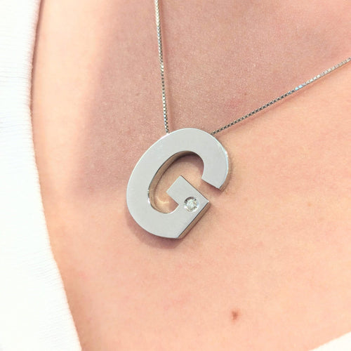 Collier Collier G en or blanc 18 carats et diamant 58 Facettes 30443