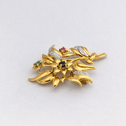 Broche Broche florale en or jaune 18 carats 58 Facettes 31190
