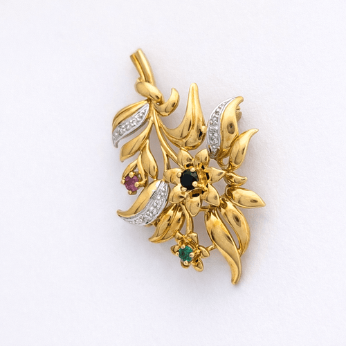 Broche Broche florale en or jaune 18 carats 58 Facettes 31190