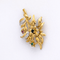 Broche Broche florale en or jaune 18 carats 58 Facettes 31190