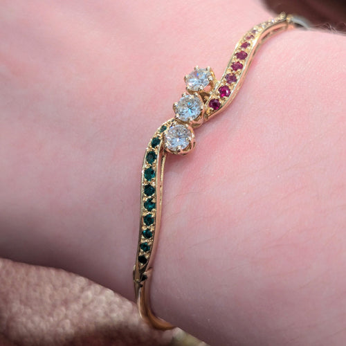 Bracelet Bracelet jonc en or jaune 18 carats avec diamants, rubis et émeraudes 58 Facettes 31215