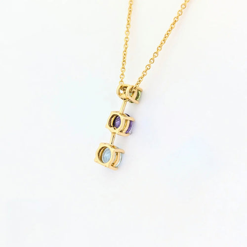 Collier Collier en or jaune 18 carats avec aigue-marine, améthyste et péridot 58 Facettes 31899