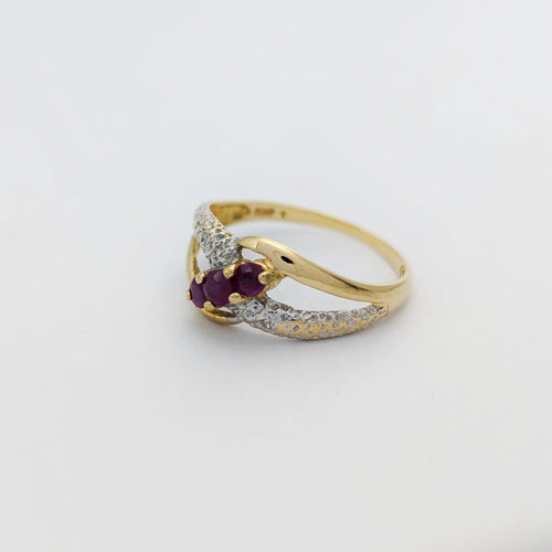 Bague 53 Bague croisée en or jaune 18 carats avec rubis et diamants 58 Facettes 32235