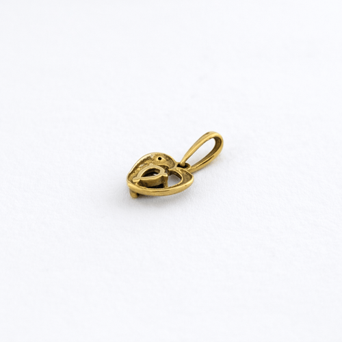 Pendentif Pendentif cœur en or jaune 18 carats, saphir poire et diamants 58 Facettes 32934