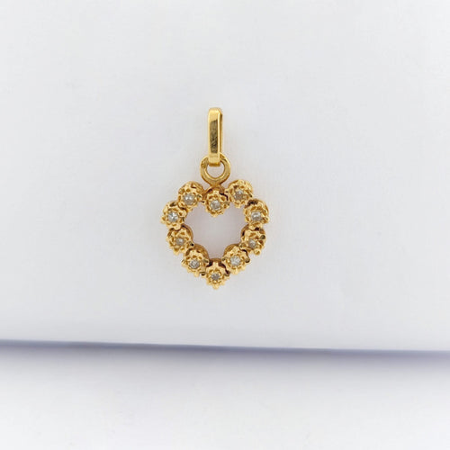Pendentif Pendentif cœur en or jaune 18 carats et diamants 58 Facettes 33147