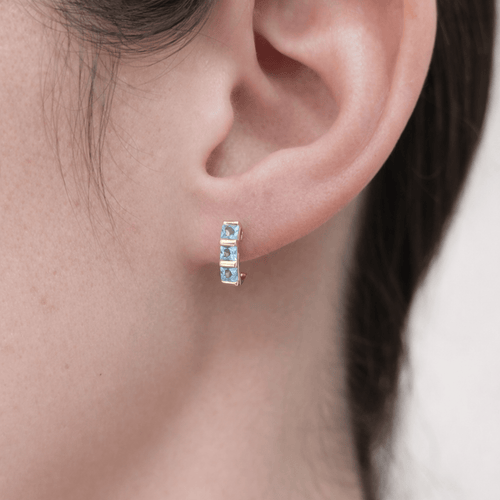 Boucles d'oreilles Boucles d’oreilles demi-lune en or jaune 18 carats et aigues-marines 58 Facettes 33685