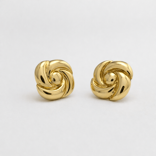 Boucles d'oreilles Boucles d’oreilles rosace stylisée en or jaune 18 carats 58 Facettes 33710