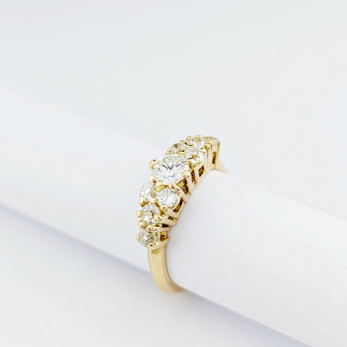 Bague 50 Bague en or jaune 18 carats et neuf diamants 58 Facettes 33771