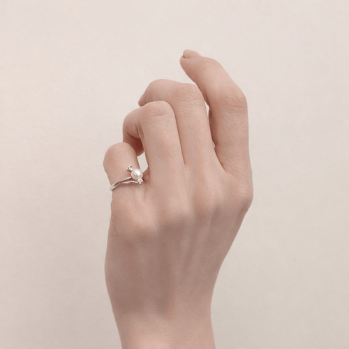 Bague 47 Bague perle et diamants en or blanc 18 carats 58 Facettes 34427