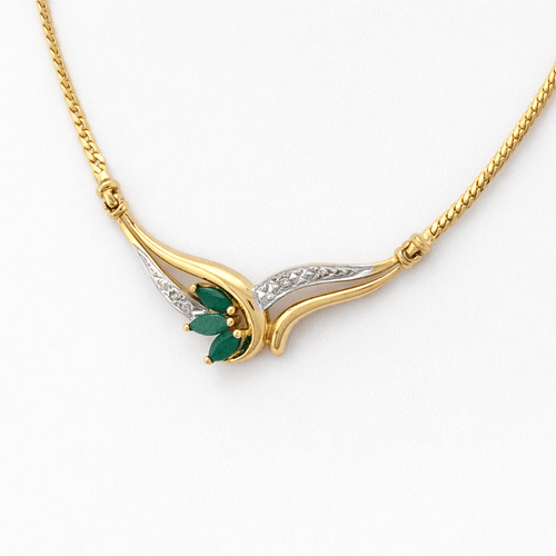 Collier Collier stylisé en or jaune 18 carats, émeraudes et diamants 58 Facettes 34580