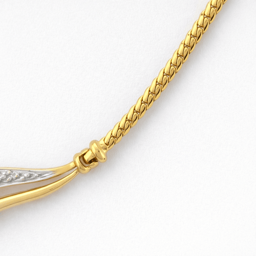 Collier Collier stylisé en or jaune 18 carats, émeraudes et diamants 58 Facettes 34580