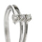 Bague Bliss - Bague trilogie contrariée en or blanc 18 kt et diamants 0,18 ct 58 Facettes 35929