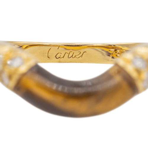 Bague 52 Cartier - Bague en or jaune sertie d’œil de tigre et diamants 58 Facettes 3662247RV