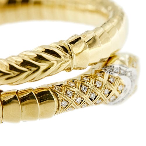 Bracelet Bracelet serpent rigide contrarié en or jaune 18 kt et diamants 58 Facettes 39752