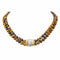Collier Collier choker en or jaune et blanc 18 carats, œil-de-tigre et diamants 58 Facettes 4615473CN