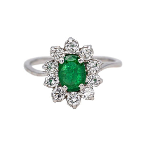 Bague 50 Bague marguerite en or blanc 18 carats, émeraude et diamants 58 Facettes 4941667CN