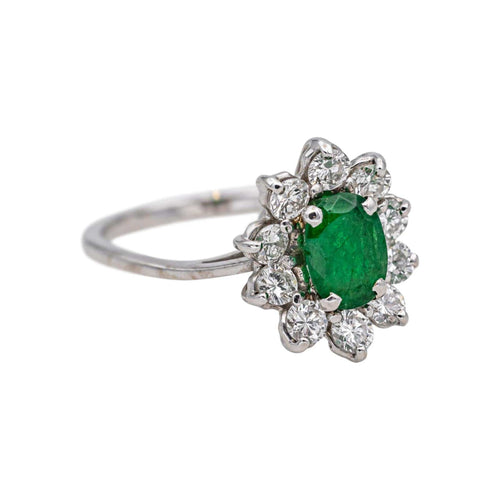 Bague 50 Bague marguerite en or blanc 18 carats, émeraude et diamants 58 Facettes 4941667CN