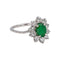 Bague 50 Bague marguerite en or blanc 18 carats, émeraude et diamants 58 Facettes 4941667CN