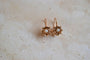 Boucles d'oreilles Collection Crush - Dormeuses décor gouvernail en or jaune 14 carats et perles 58 Facettes 3106