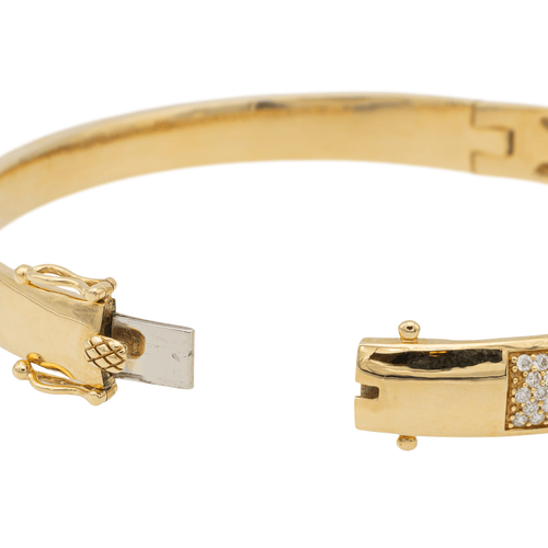 Bracelet Bracelet jonc rigide en or jaune 18 carats pavé de diamants 58 Facettes 578184CD