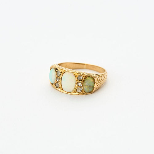 Bague 55 Elégante Bague Jarretière Or Jaune, Opale et Diamants 58 Facettes QUI05382