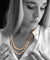 Collier Collier double rang de perles en or blanc 18 carats et saphirs 58 Facettes