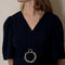 Pendentif Hermès Chaîne d'Ancre - Pendentif rond en argent et cordelière en coton noir 58 Facettes 58FC38
