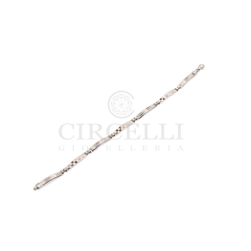 Bracelet Bracelet à plaques motif damier en or blanc 18k 58 Facettes 12335176