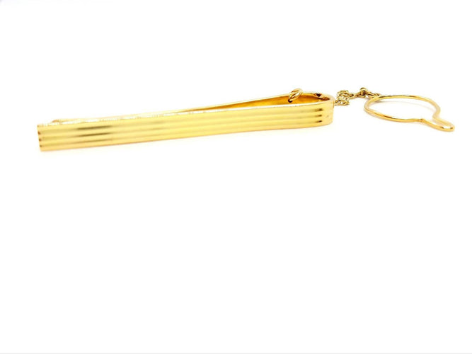 Broche Hermès - Pince à cravate en or jaune 18 carats 58 Facettes 720124CN