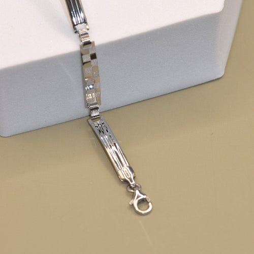 Bracelet Bracelet à plaques motif damier en or blanc 18k 58 Facettes 12335176