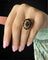 Bague 57 Bague Margherita - Grenat pyrope ovale et 12 grenats en or jaune 18 carats 58 Facettes