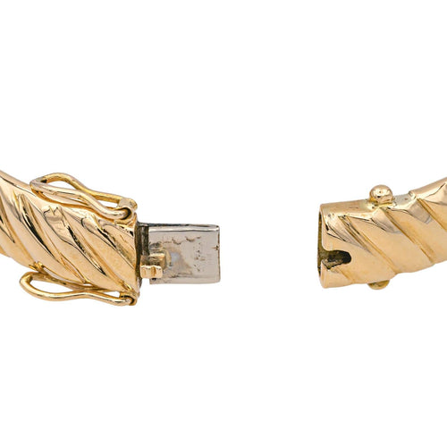 Bracelet Bracelet jonc rigide ovale en or jaune 18 carats 58 Facettes 978815CD