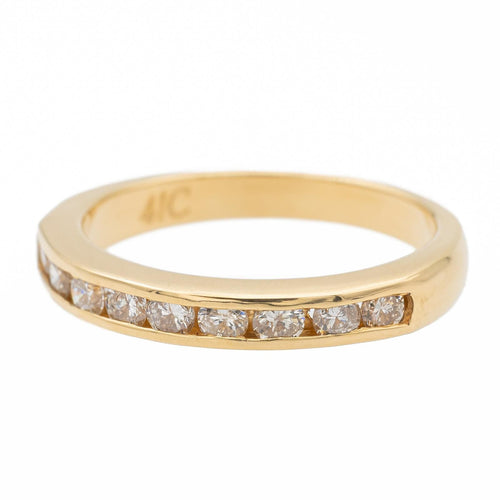 Bague 50 Bague demi-alliance en or jaune avec diamants 58 Facettes 990258CN