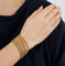 Bracelet Bracelet souple avec nombreuses chainettes en or jaune perlé 58 Facettes DV0624-17