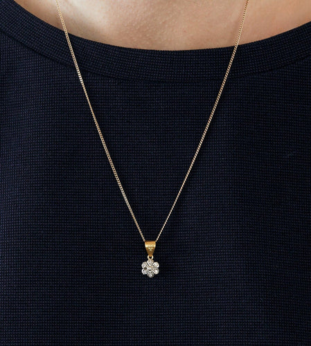 Pendentif Pendentif "Fleur" en or jaune et or blanc et petits diamants 58 Facettes DV0492-4