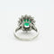 Bague 46 Bague marguerite or blanc, émeraude et diamants 58 Facettes DV0629-2