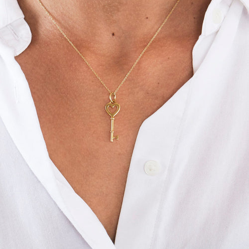 Collier TIFFANY & Co - Collier Clef en or jaune 58 Facettes DV4363-1
