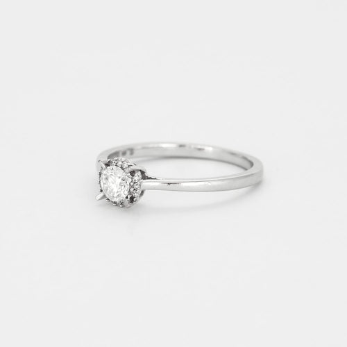 Bague solitaire en or gris et diamant