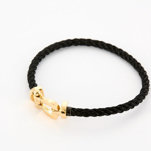Bracelet FRED - Force 10 - Bracelet en acier et or jaune 58 Facettes DV0763-3