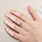 Bague demi-alliance en or blanc et diamants