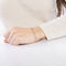 Bracelet Bracelet grain de café, or blanc 58 Facettes DV0846-2