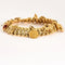 Bracelet Bracelet breloques or jaune et émail 58 Facettes DDV9410-1