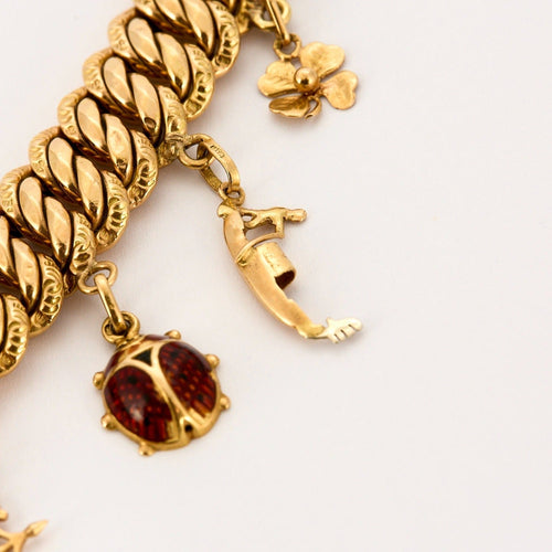 Bracelet Bracelet breloques or jaune et émail 58 Facettes DDV9410-1